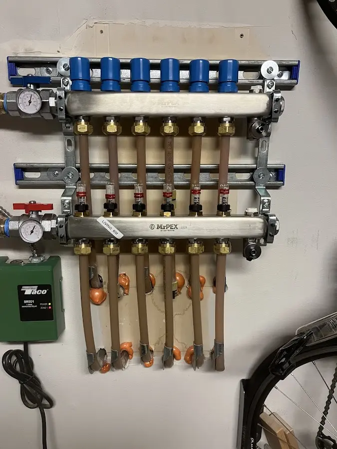 Plumber performing Gas Line Installation at a residential property in Waltham